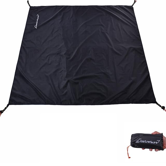 Telo pavimento impermeabile grigio Clostnature steso sotto una tenda da campeggio